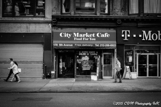 Strolling down 5th Ave., still one of the last bastions of Fashion and Photography Industry. 